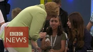 Angela Merkel criticised over crying refugee  BBC News [upl. by Neehahs]