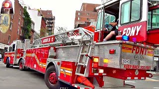 Watch Big Long Fire Truck with RearWheel Steering Back Up  FDNY Ladder 20 [upl. by Weisburgh650]