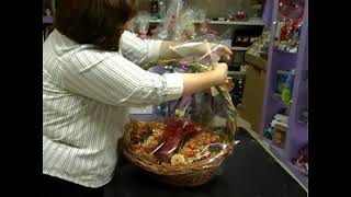 How To Wrap A Gift Basket With Cellophane Part 1 [upl. by Dinan]