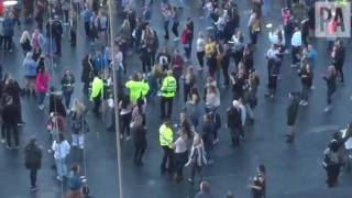 Police officers and security guards dance along with Coldplay Manchester [upl. by Ankeny]