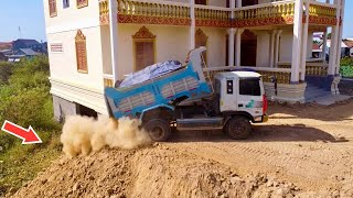 Team dump truck 5ton Unloading soil Hold the foundation of the house pushing by bulldozer black [upl. by Sanyu204]