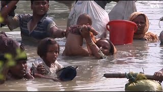 Rohingya refugees cross river to reach Bangladesh  VOANews [upl. by Idihsar221]