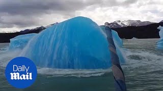 Extraordinary moment massive iceberg explodes next to boat [upl. by Theresita]