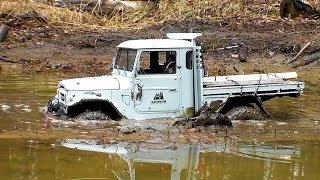 RC Extreme Pictures  RC OFF Road Truck Mudding 4x4 – Axial Toyota FJ45 VS Jeep Wrangler Rubicon [upl. by Aleacim]