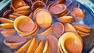 100 clay diyas soaking in water  earthy sound  Satisfying clay diya [upl. by Annahsad]