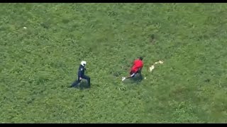 Watch Cop jumps from helicopter to nab crook [upl. by Elaweda271]