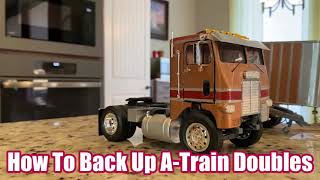 How To Part 1 Backing Double Trailers Instructional video A train Back up Reversing Doubles [upl. by Sukcirdor]