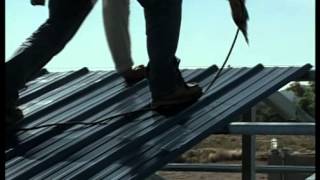 Metal Building Installation Step 19 Roof Panels [upl. by Ecahc494]