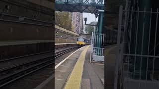 707 008 departs at Woolwich dockyard and 707 026 arrives at Woolwich dockyard with a 2 tone horn [upl. by Robers921]