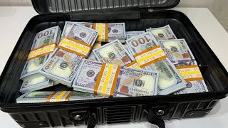 Packing a Suitcase with Dollars Watch the Wealth Pile Up [upl. by Evadnee843]