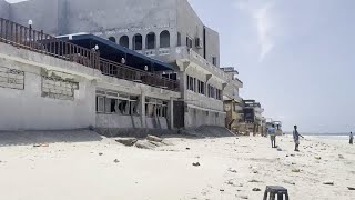 Somali police say 32 dead in attack on Mogadishu beach hotel [upl. by Eaves216]