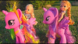 Elsa and Anna toddlers ride their bikes and the ponies adventures with my little pony [upl. by Ralf]