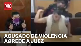 Hombre acusado de violencia intrafamiliar amenaza a juez y arroja micrófono y mesa [upl. by Ajet669]