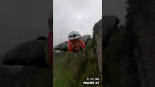 Trying To Smile While Wingsuit BASE jumping insta360 wingsuit fail [upl. by Anirahtak902]