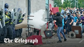 Antiimmigration protesters smash through migrant hotel in Rotherham [upl. by Nevear632]