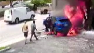 Surveillance video captures good Samaritans saving woman child from burning vehicle [upl. by Nas]