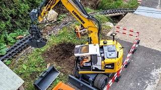 Installation of garbage collecting container RC Excavator Liebherr A918 clamshell Dumper Sprinter [upl. by Armando]