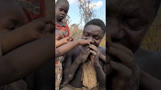 Hadza man feeding his children a favorite Soup middle of nowhere 😄‼️😋food hadzabetribe [upl. by Haas]