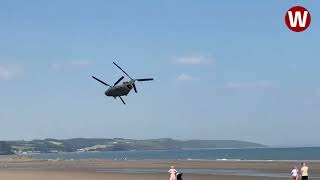 Moment lowflying Chinook helicopter thunders over Welsh beach [upl. by Orr791]