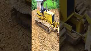 Komatsu D31P Mini Bulldozer Spreads Soil dozer bulldozer heavyequipment construction machine [upl. by Eoz]