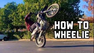 How to Wheelie KLX300 or any dirtbike  Wheelie Tutorial [upl. by Gnidleif]