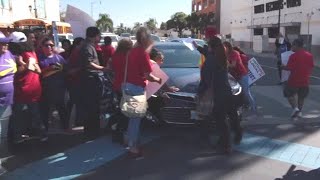 Man drives through protesters blocking road in Southern California [upl. by Ecitnerp]