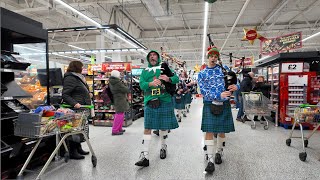 Scotland the Brave as a festive Newtonhill Pipe Band march through Asda in Portlethen at Christmas [upl. by Santos]