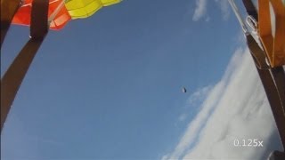 Meteorite filmed by skydiver Footage of hurtling black rock filmed over Norway [upl. by Guillaume2]