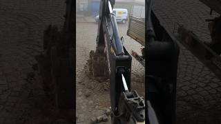 Hard work ripping pavers with a JCB [upl. by Larena529]