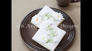 Royal Icing Piped Daises on a Flower Nail [upl. by Arolf]