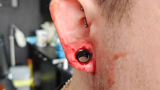 10mm biopsy punch tunnel dermal punch Extreme ear piercing streched ears Extreme Body Piercing [upl. by Renwick]