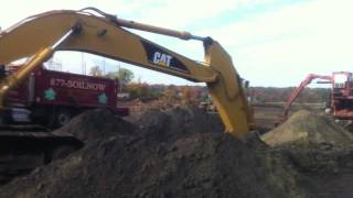 Grillo Services Excavator Digging A Trench [upl. by Nosduh]