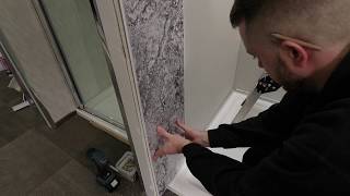 Fitting Bathroom Shower Panels [upl. by Lleumas]