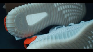 Adidas yeezy boost 350 v2 tail light commercial  unboxing video [upl. by Yrbua568]