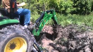 Digging a Spring Fed Well  John Deere 3320 amp 485 Backhoe [upl. by Lledyl431]