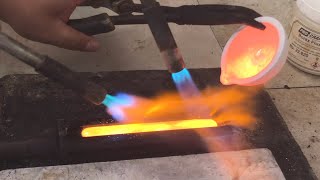 melting 4 oz of Canadian maple leaf gold coin with propane torch [upl. by Gnuhc853]