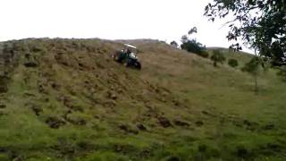 John Deere 5700 Tractor working in a 5060 degrees hill [upl. by Llerraj668]