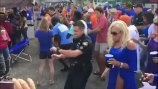 Watch This Police Officer Join Football Fans Dancing To Cupid Shuffle [upl. by Mellette]