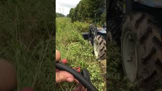 Farmall 140 passing a 38hp diesel tractor [upl. by Mateya]