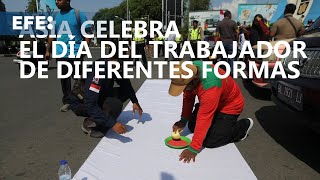 Manifestaciones denuncias y vacaciones marcan el Día del Trabajador en Asia [upl. by Freeland]