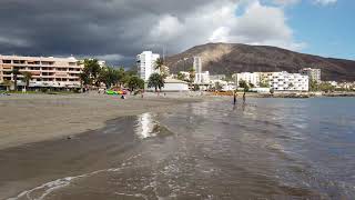 Playa de Los Cristianos beach in Los Cristianos resort south of Tenerife Walking tour late October [upl. by Yrret]