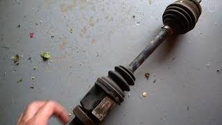 How to check a drive shaft axle  you can do this without removing the axle from the car [upl. by Balcer]