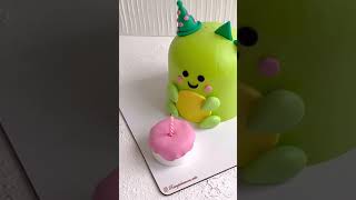 How to Design a Dinosaur Cake with Fondant [upl. by Asilec]