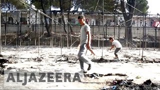 Greece Refugees return to Lesbos camp after fire [upl. by Guise]