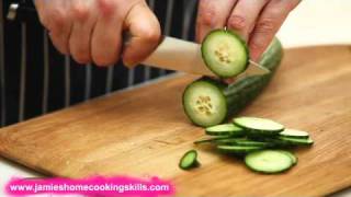 Chopping a cucumber  Jamie Olivers Home Cooking Skills [upl. by Marcy326]