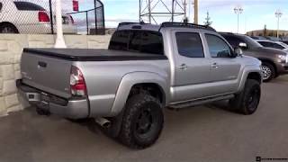 Lifted 2015 Toyota Tacoma Double Cab TRD Sport on 26570R17 Tires [upl. by Amilas253]