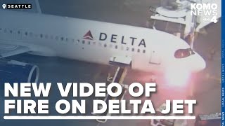 Delta plane catches fire after landing in Seattle [upl. by Ahsimal]