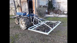 ISEKI TX1510F with Chain Harrow pasture tow weidesleep herse de prairie [upl. by Nickles]