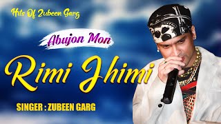 RIMI JHIMI  GOLDEN COLLECTION OF ZUBEEN GARG  ASSAMESE LYRICAL VIDEO SONG  ABUJON MON [upl. by Jarl617]