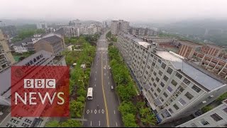 China Drone tour of Wuxi New Town  BBC News [upl. by Hcra]